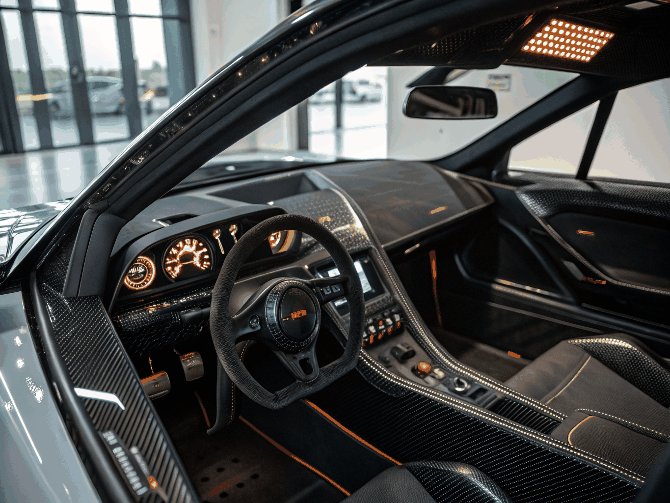 Driver's perspective of a luxury sports car interior